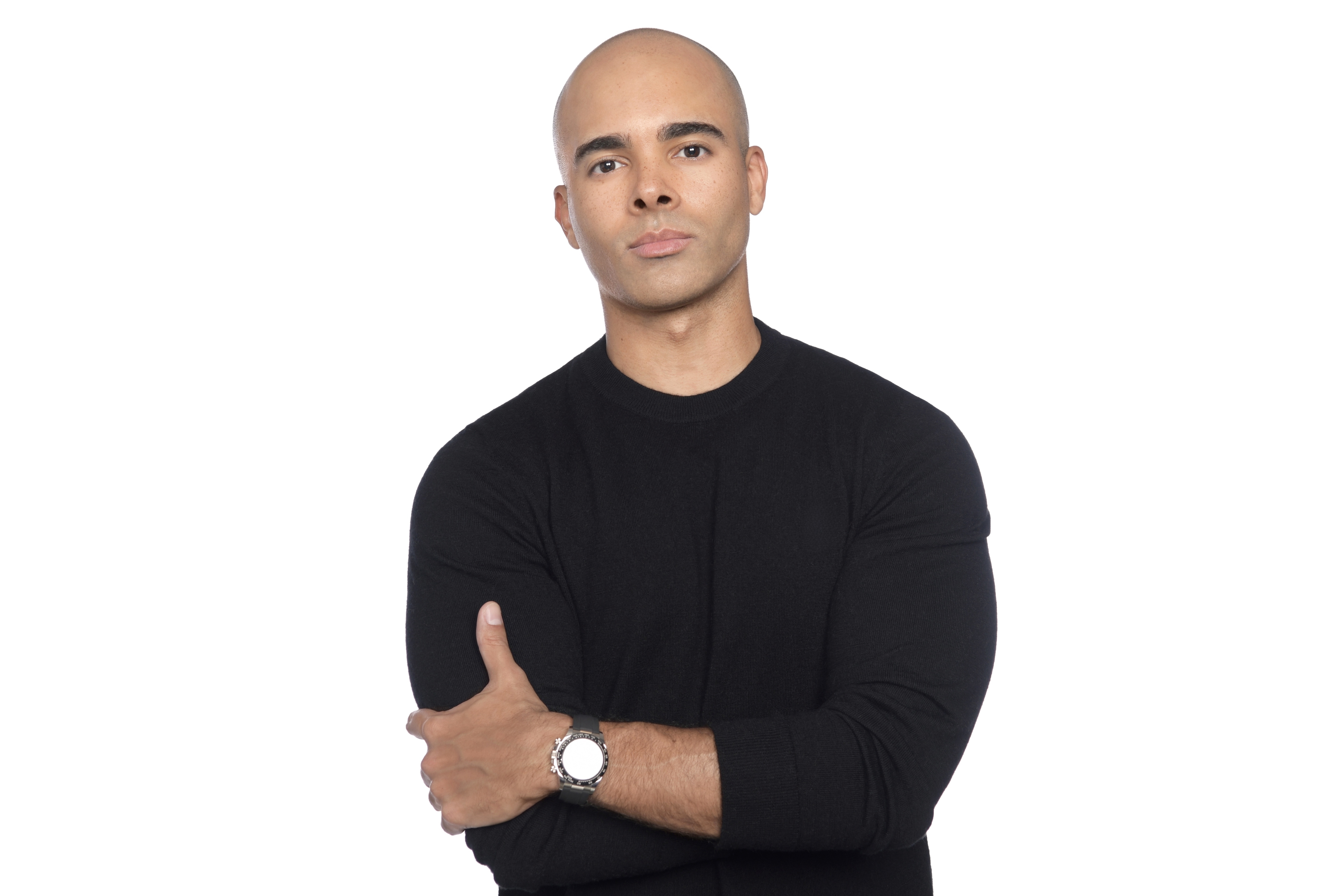 Studio portrait of Billy Pressley wearing a black shirt against a white background.