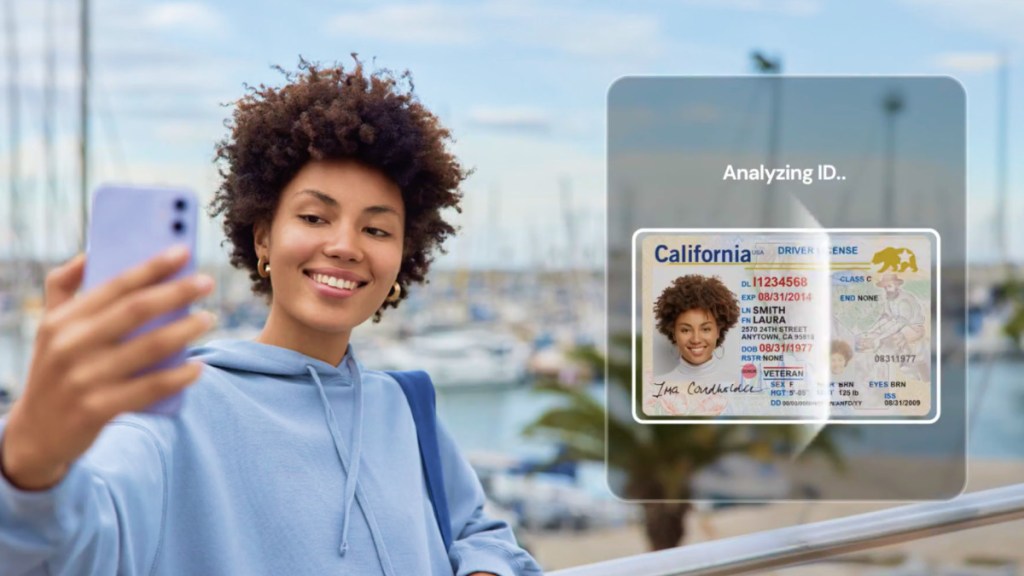 Woman doing face recognition for age verification on a mobile phone